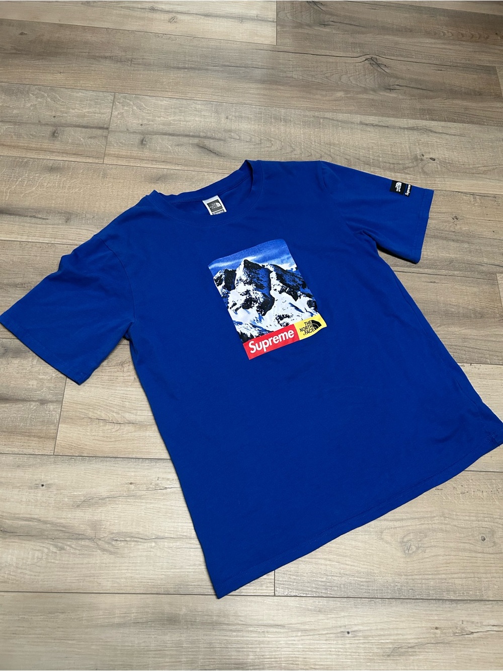 FW17 Supreme x The North Face Royal Blue Graphic Tee with Red and Yellow Accents